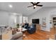 Comfortable living room with hardwood flooring, neutral paint and furniture at 666 Tryon Pl, Gastonia, NC 28054