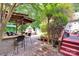 Stunning outdoor space with a bar, patio, and deck, perfect for entertaining and enjoying the beautiful backyard at 666 Tryon Pl, Gastonia, NC 28054