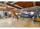 Large unfinished basement with a car, stairs and a walkout entry at 701 4Th Ne Ave, Conover, NC 28613