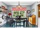 Bright dining area showcases a table, chairs, and ample natural light from the window at 701 4Th Ne Ave, Conover, NC 28613