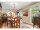Formal dining room showcasing hardwood floors, elegant chandelier, and classic furniture at 701 4Th Ne Ave, Conover, NC 28613