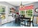 Dining room features a table, chairs, natural light, and access to the exterior at 701 4Th Ne Ave, Conover, NC 28613
