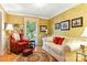 Comfortable living room with hardwood floors, patterned wallpaper, and ample seating at 701 4Th Ne Ave, Conover, NC 28613