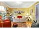 Cozy living room featuring hardwood floors, comfortable seating, and decorative accents at 701 4Th Ne Ave, Conover, NC 28613