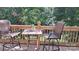Outdoor deck with a table, chairs, and a view of the lake at 729 Victoria Ln, Hickory, NC 28601