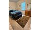 A cozy bedroom features a patterned comforter, area rug, and a wooden dresser at 729 Victoria Ln, Hickory, NC 28601