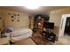 Bedroom featuring a bed, dresser, bookcase, and creative cave mural at 729 Victoria Ln, Hickory, NC 28601