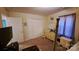 Bedroom with neutral walls, dresser, and view of a closet at 729 Victoria Ln, Hickory, NC 28601