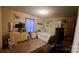 Bedroom with a cozy bed, dresser, and framed wall art decor at 729 Victoria Ln, Hickory, NC 28601