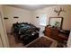 Bedroom featuring a sleek bed, a window, and neutral-colored walls at 729 Victoria Ln, Hickory, NC 28601