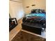 Bedroom features a storage bench, rug, and a double door closet at 729 Victoria Ln, Hickory, NC 28601