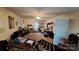 Large bonus room, which is being used as a music room, with neutral carpet, and ceiling fan at 729 Victoria Ln, Hickory, NC 28601