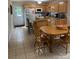 Bright kitchen featuring a central island, adjacent dining area and updated appliances at 729 Victoria Ln, Hickory, NC 28601