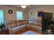 Cozy living room boasts large sectional sofa, wood floors, natural lighting, and entertainment center at 729 Victoria Ln, Hickory, NC 28601