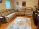 Cozy living room featuring hardwood floors, a large sectional sofa and area rug at 729 Victoria Ln, Hickory, NC 28601