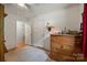Bedroom with wood floors, a ceiling fan, natural light, and a wooden dresser at 742 Stonecrest Dr, Statesville, NC 28625