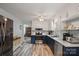 Modern kitchen featuring stainless steel appliances, stylish countertops, and ample cabinet space at 742 Stonecrest Dr, Statesville, NC 28625