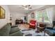 Comfortable living room with neutral walls, hardwood floors, and ample natural light at 742 Stonecrest Dr, Statesville, NC 28625