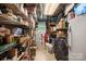 Organized pantry with ample shelving for storage and a variety of household goods at 742 Stonecrest Dr, Statesville, NC 28625