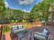 Inviting back deck with comfortable seating and a grill, perfect for outdoor entertaining at 901 Deercross Ln, Waxhaw, NC 28173