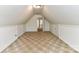 A bonus room with neutral carpet, a door to the hallway, and easy access to closet space at 9029 Torrence Crossing Dr, Huntersville, NC 28078