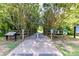 Scenic greenway trail lined with mature trees, offering a peaceful outdoor experience at 9029 Torrence Crossing Dr, Huntersville, NC 28078
