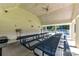 A picnic area featuring covered seating, views of the pool, and close proximity to the clubhouse at 9029 Torrence Crossing Dr, Huntersville, NC 28078