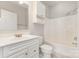 This bathroom has white tile and modern sink and shower at 9271 Meadow Vista Rd, Charlotte, NC 28213