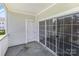 Patio with white siding and a view of the treeline at 9271 Meadow Vista Rd, Charlotte, NC 28213