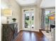 Entryway showcasing hardwood floors, a bright glass door, and stylish decor at 1011 Duntov Dr, Monroe, NC 28110