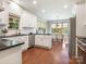 Open kitchen with modern appliances and a view of the dining area, bright and inviting at 1011 Duntov Dr, Monroe, NC 28110