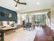 Open-concept living space with hardwood flooring, stylish decor, and plenty of room at 1011 Duntov Dr, Monroe, NC 28110