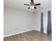 A spacious bedroom features light gray walls and a window with gray curtains at 1140 Mckinnon Dr, Rock Hill, SC 29732