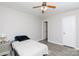 This bedroom has a ceiling fan and a door that leads to another room at 1140 Mckinnon Dr, Rock Hill, SC 29732