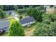 Cozy home with a deck, nestled among lush trees in a serene neighborhood setting; a peaceful retreat at 1265 39Th Street Cir, Hickory, NC 28602