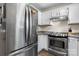 This kitchen has stainless steel appliances and a modern layout, great for cooking at 1265 39Th Street Cir, Hickory, NC 28602
