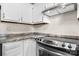Modern electric oven and white cabinets provide a clean look in this kitchen at 1265 39Th Street Cir, Hickory, NC 28602