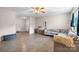Spacious living room with plank floors, ceiling fan, and cozy furniture at 1265 39Th Street Cir, Hickory, NC 28602