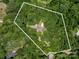 Aerial view of the home nestled within a lush, tree-filled lot at 14019 Fountain Ln, Charlotte, NC 28278