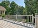 View from the back deck offers a serene view of the surrounding forest at 14019 Fountain Ln, Charlotte, NC 28278