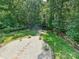 Aerial view of the backyard, showcasing a stone path leading to a firepit at 14019 Fountain Ln, Charlotte, NC 28278