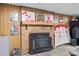 Basement with a wood burning fireplace and retro decor at 143 Bostian Lake Rd, Statesville, NC 28677
