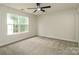 Spacious carpeted bedroom with large window providing ample natural light at 1628 Sandpiper Dr, Rock Hill, SC 29732