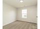 Neutral bedroom with a window offering natural light and plush carpeting at 1628 Sandpiper Dr, Rock Hill, SC 29732
