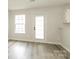 Dining room features luxury vinyl plank flooring and natural light at 1628 Sandpiper Dr, Rock Hill, SC 29732