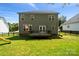 The home's backyard has a deck, playset, and a privacy fence at 1677 Shetland Ln, Rock Hill, SC 29730