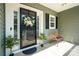 Inviting front porch with a decorative wreath and comfortable seating area at 1677 Shetland Ln, Rock Hill, SC 29730
