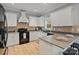 Well-appointed kitchen featuring granite countertops, ample cabinets, and modern appliances at 1677 Shetland Ln, Rock Hill, SC 29730