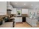 Open kitchen with granite countertops, modern appliances, a breakfast bar, and a sink with a view at 1677 Shetland Ln, Rock Hill, SC 29730