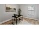 Bright office space with light-colored walls, hardwood flooring and large picture window at 1677 Shetland Ln, Rock Hill, SC 29730